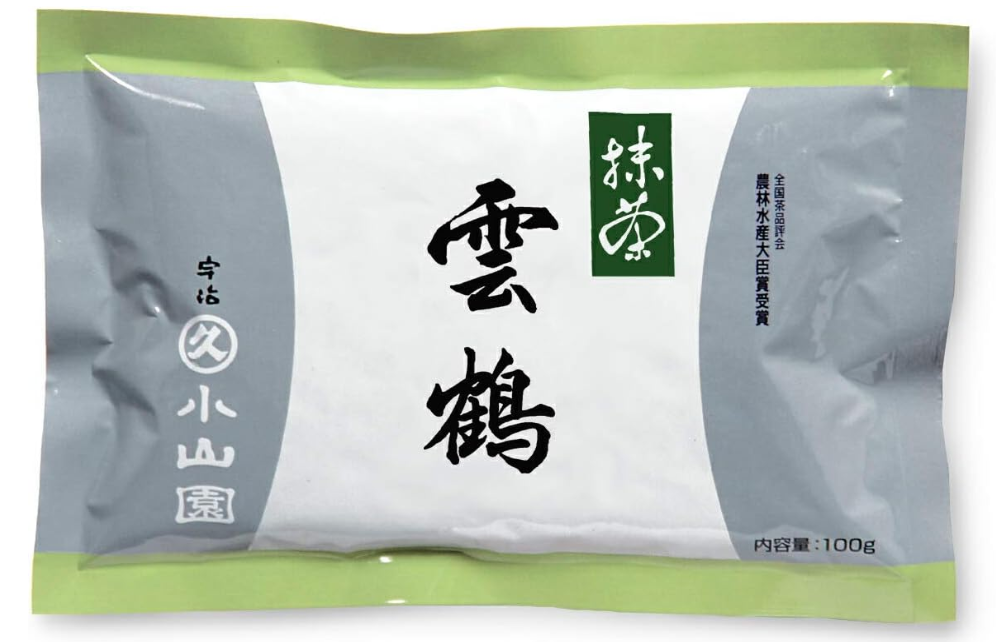 A bag of UNKAKU Ceremonial Grade Matcha by Marukyu Koyamaen with Japanese characters displayed on the label.