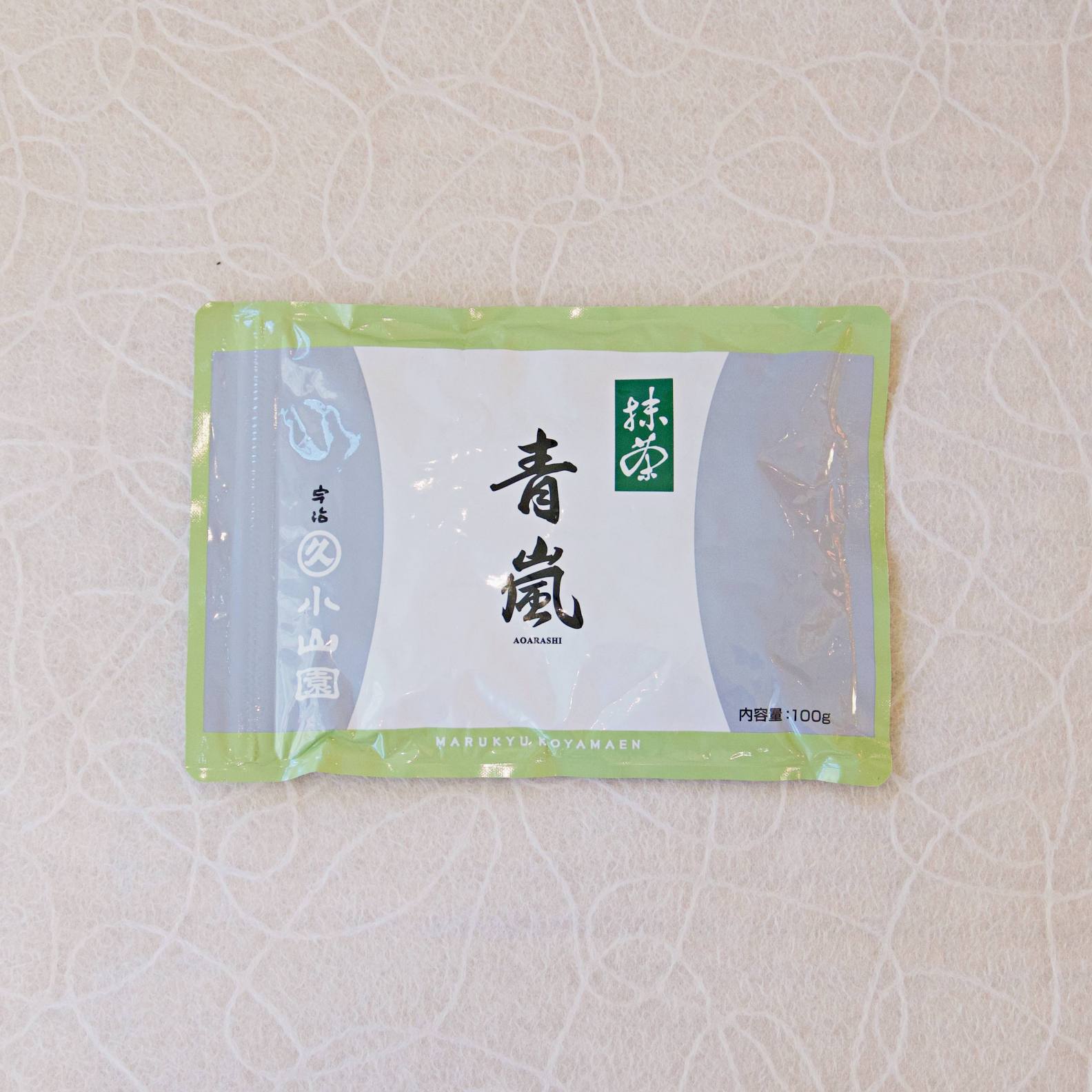 A can of AOARASHI Marukyu Koyamaen Uji Matcha with Japanese characters and green branding elements on a white background.