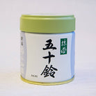 A can of ISUZU Marukyu Koyamaen Matcha with Japanese characters displayed on the label.
