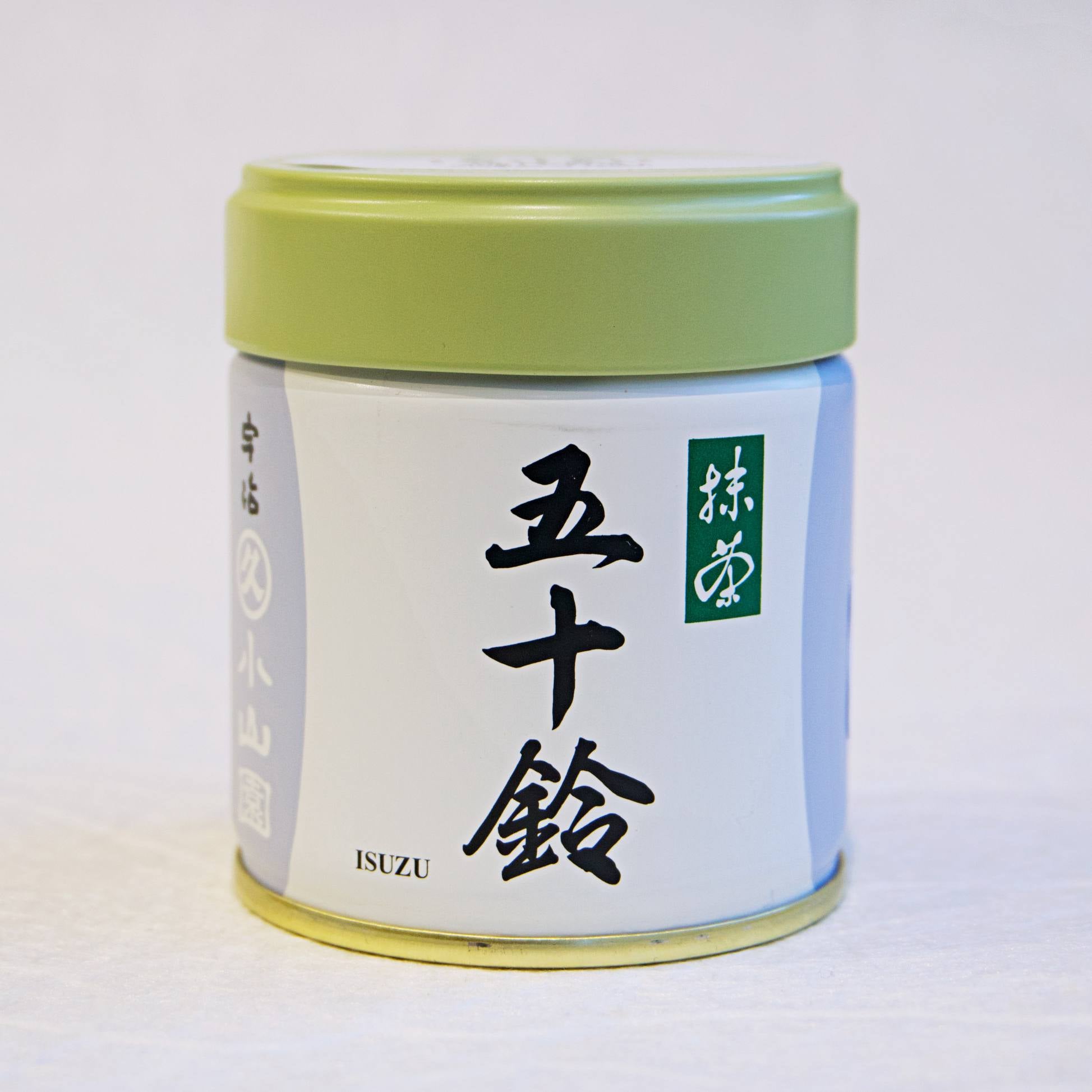 A can of ISUZU Marukyu Koyamaen Matcha with Japanese characters displayed on the label.