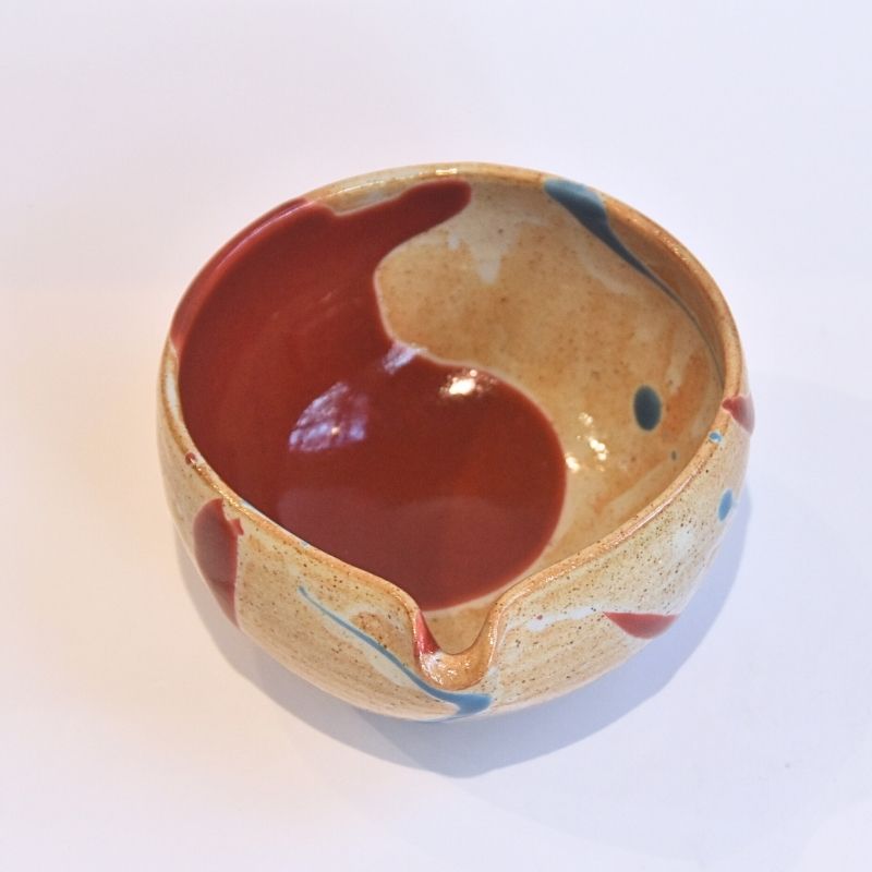 Ceramic bowl with a unique design on a white background