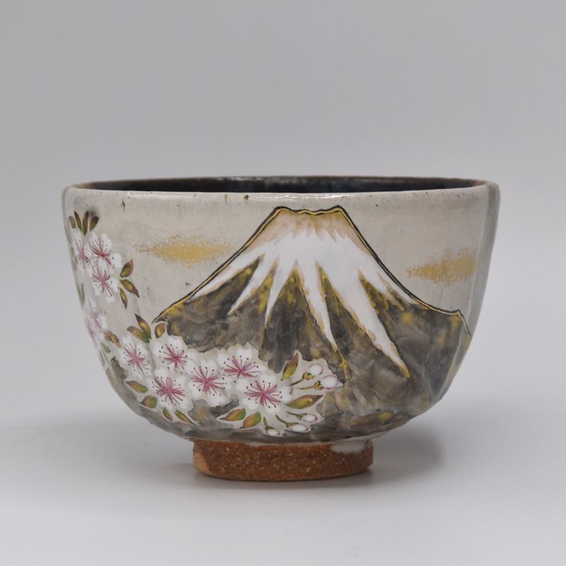 Ceramic bowl with Mount Fuji and cherry blossoms design on a gray background