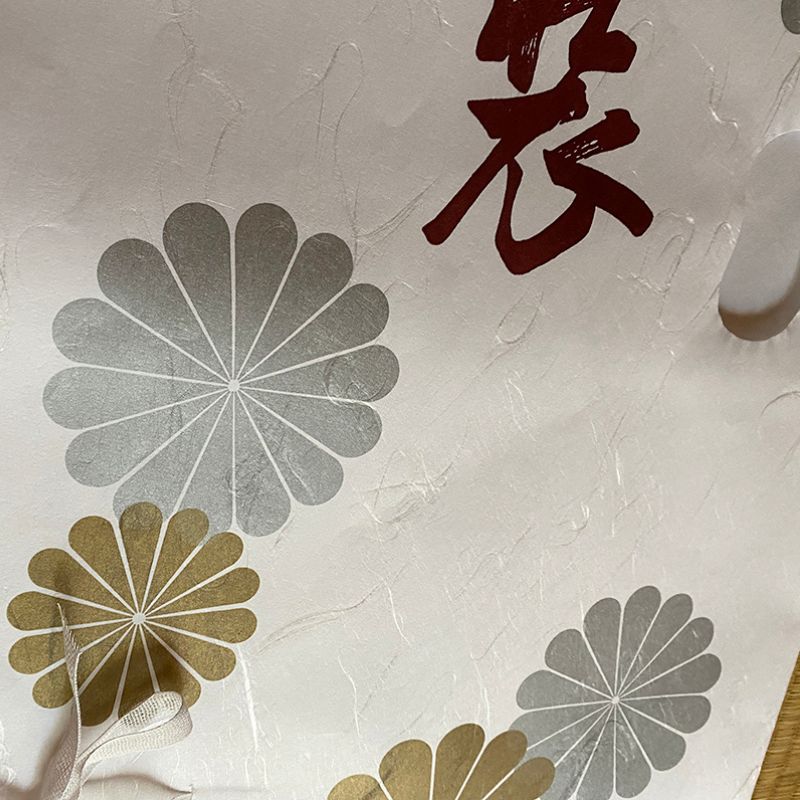 Enlarged image of the packaging for Nara Tea Co.'s Tatoushi l kimono Storage Paper with Strings, a set of 10 sheets.