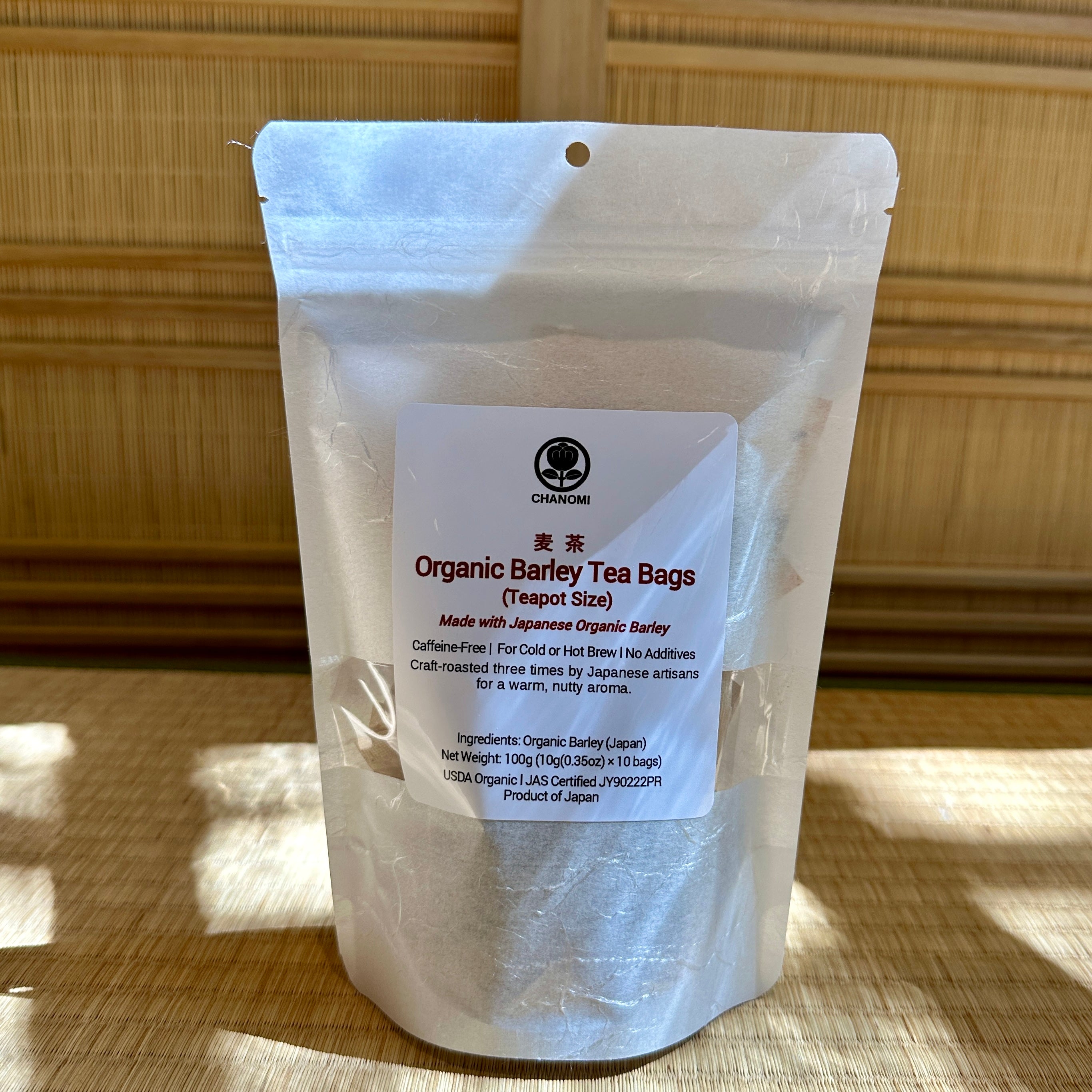 Clear package of Organic Barley Tea Bags with a label on a wooden surface