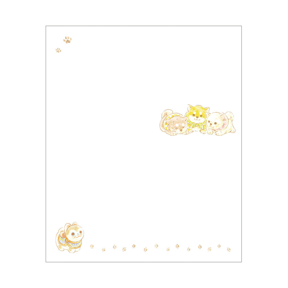 Notepad with cartoon dog illustrations on a white background