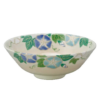 Ceramic bowl with floral design on a gray background