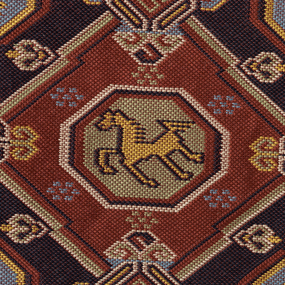 Close-up of a stylized horse inside an octagonal medallion on the Nishijin silk kobukusa.