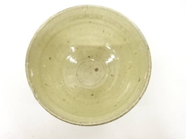 Top view of the Koijitsu matcha bowl showing its softly glazed interior, visible throwing rings, pale speckling, and natural firing variation.