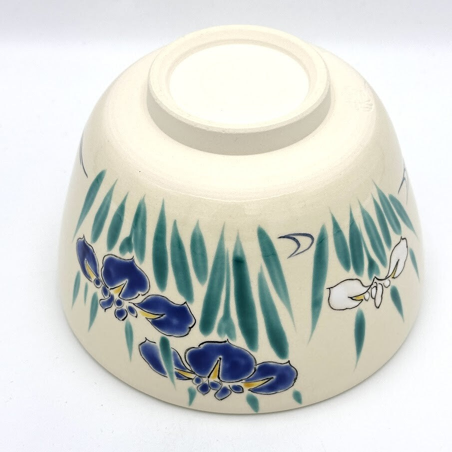 Underside view of the Ayame Kyo Ware matcha bowl showing its ceramic foot and hand-painted Japanese iris decoration