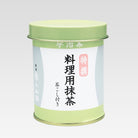 Green tea canister with Japanese text on a light gray background