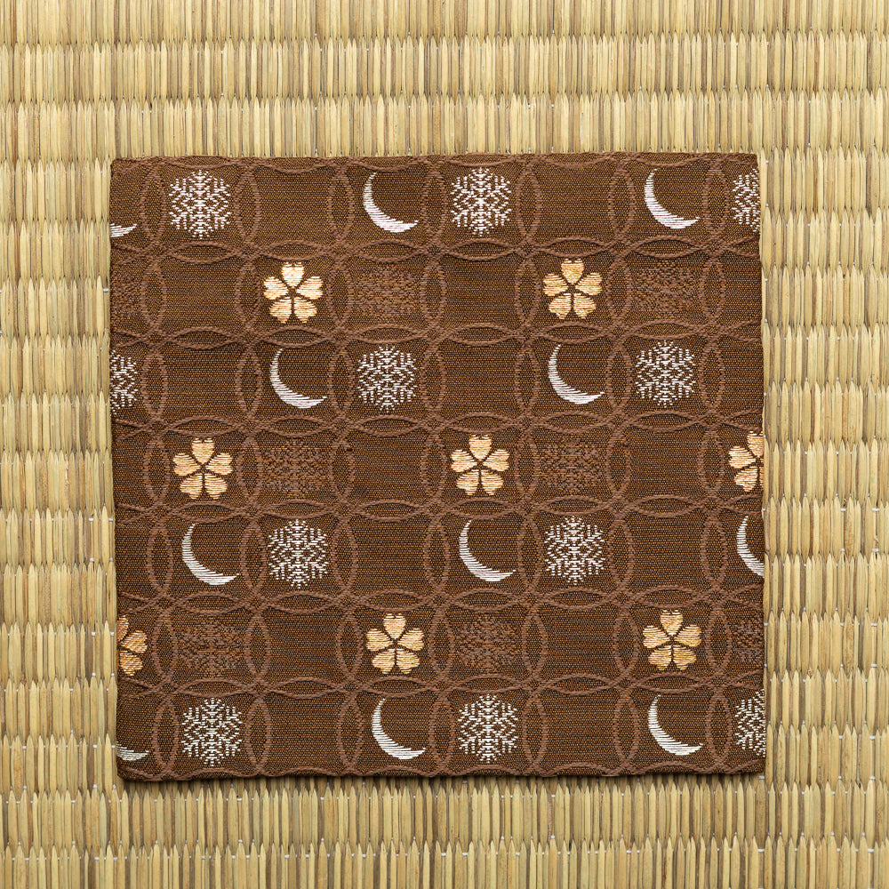 Brown Chitose-bon kobukusa by Kitamura Tokusai featuring the Shippo Setsugekka pattern, displayed flat on tatami.