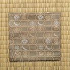 Khaki green Chitose-bon kobukusa featuring the Tantansai-preferred Shippo Setsugekka pattern, displayed flat on tatami.