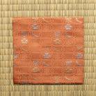 Rose Chitose-bon kobukusa by Kitamura Tokusai featuring the Shippo Setsugekka pattern, displayed flat on tatami.