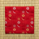 Wine red Chitose-bon kobukusa by Kitamura Tokusai featuring the Shippo Setsugekka pattern, displayed flat on tatami.