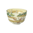 Kyo Ware matcha bowl featuring cranes, Sho-Chiku-Bai pine, bamboo and plum motifs with elegant gold leaf accents