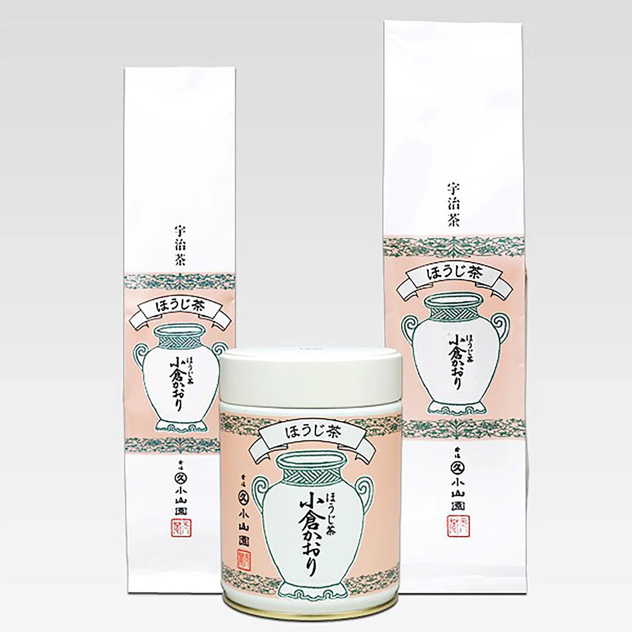 Ceramic tea canister with matching packaging on a white background