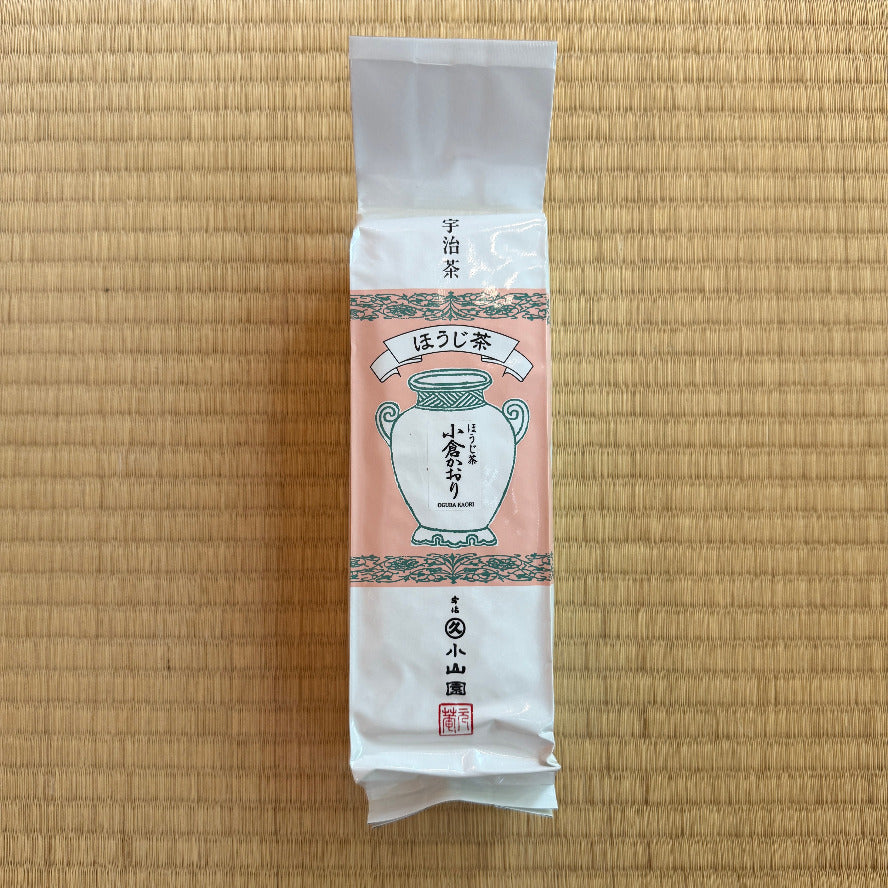 Tea package with a traditional design on a wooden surface
