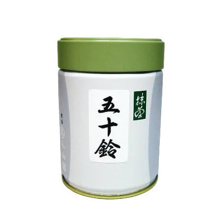 White container with green lid and label on a white background