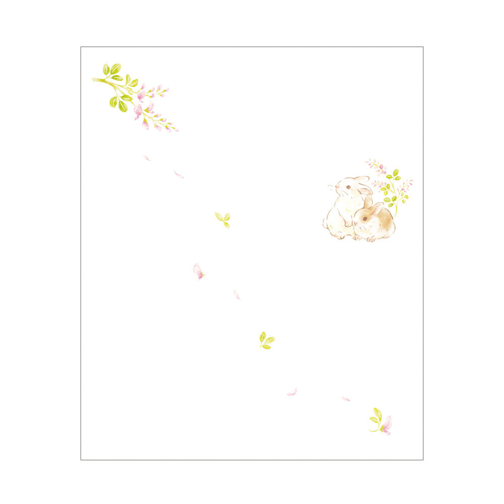 Notebook with a bunny and floral design on a white background