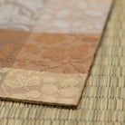 Angled view of Kaka Karakusa-mon Donsu Dashibukusa and Kobukusa woven from Kyoto Nishijin silk for the Japanese tea ceremony, Way of Tea and Otemae.