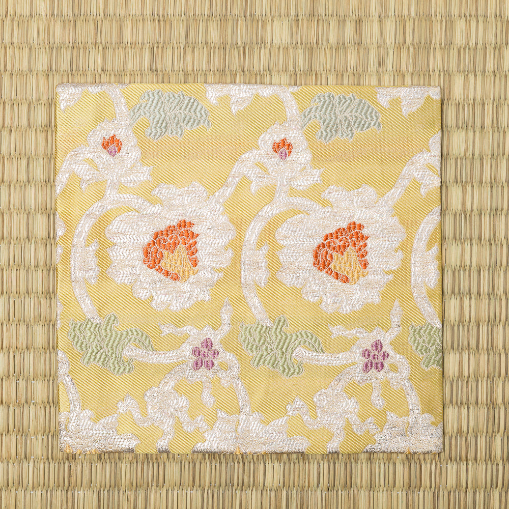 Traditional peony and arabesque pattern on a Japanese Nishijin silk kobukusa