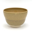 Reverse view of the Kiyomizu-yaki Eda-Ume matcha bowl highlighting its rounded form and textured warm brown glazed surface