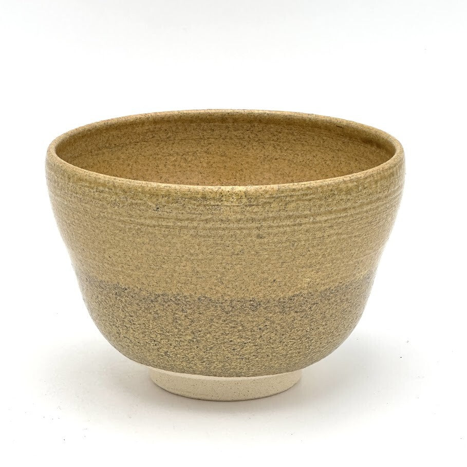 Reverse view of the Kiyomizu-yaki Eda-Ume matcha bowl highlighting its rounded form and textured warm brown glazed surface