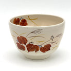 Hand-painted Kyo-yaki matcha bowl featuring the Aka Tsuta ni Suzume motif with rich red ivy leaves, sparrows, and fine autumn grasses