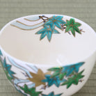 Top interior view of the Kyo-yaki Aokaede matcha bowl showing green maple leaves and gold accents extending around the inner rim