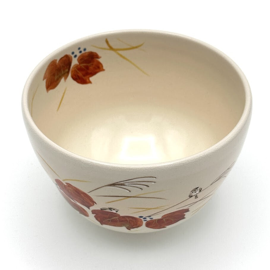 Top interior view of the Kyo-yaki red ivy and sparrow matcha bowl showing its warm ivory glaze and hand-painted autumn motif around the rim