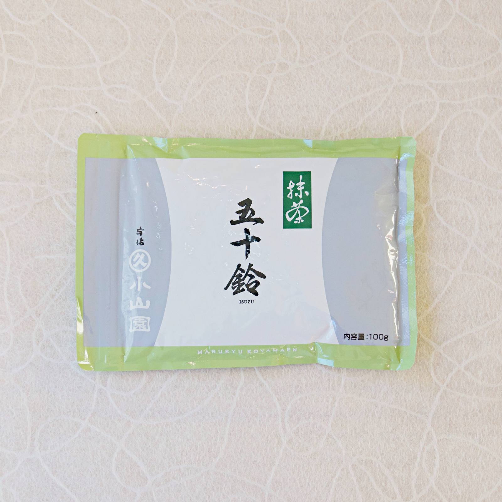 A bag of ISUZU Marukyu Koyamaen Matcha with Japanese characters displayed on the label.