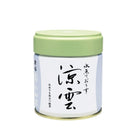 Small matcha container of marukyu koyamaen with a green lid on a white background