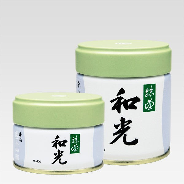 Two containers of Wako Matcha of marukyu koyamaen for Matcha Latte, one larger and one smaller.
