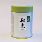 A can of Wako Matcha by Marukyu Koyamaen with green lid, white body, and label with black Japanese characters.