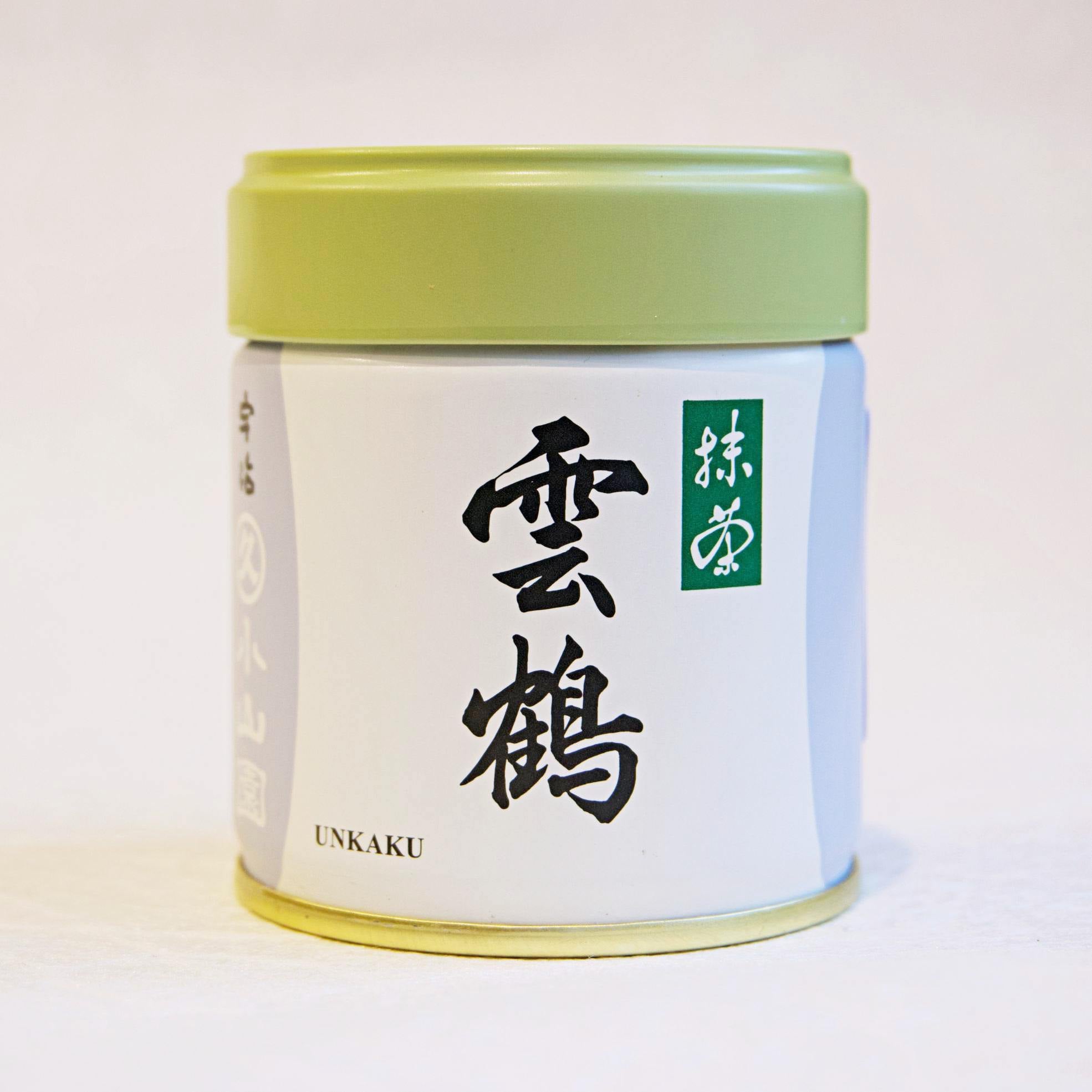A can of UNKAKU Ceremonial Grade Matcha by Marukyu Koyamaen with Japanese characters displayed on the label.