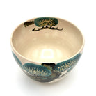 Top interior view of the Matsu matcha bowl showing hand-painted pine motifs continuing around the inner rim
