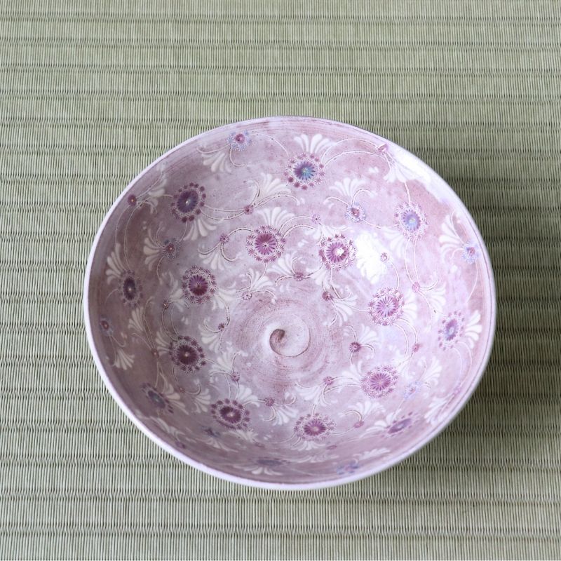 Top view of Morisato Touraku Hira Chawan showing delicate purple floral motifs across the pale interior