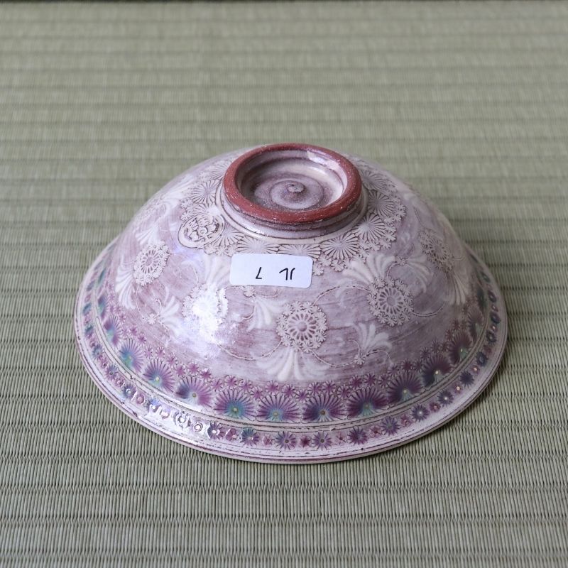 Bottom view of the Morisato Touraku purple floral Hira Chawan showing its decorated exterior and ceramic foot