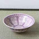 Interior view of the Morisato Touraku Hira Chawan with alternating vertical purple floral patterns