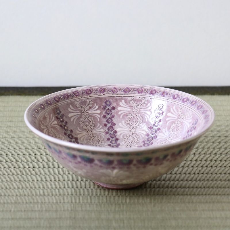 Handcrafted Morisato Touraku Hira Chawan with purple floral decoration and vertical patterned interior