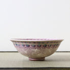 Side view of the Morisato Touraku purple floral Hira Chawan showing its wide shallow profile and decorated rim