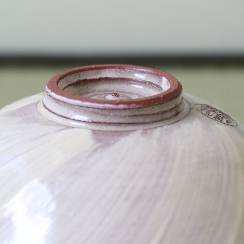 Close-up of the foot and underside of the handcrafted Morisato Touraku Hira Chawan