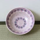 Top view of the purple floral Hira Chawan showing detailed stamped floral patterns across the interior