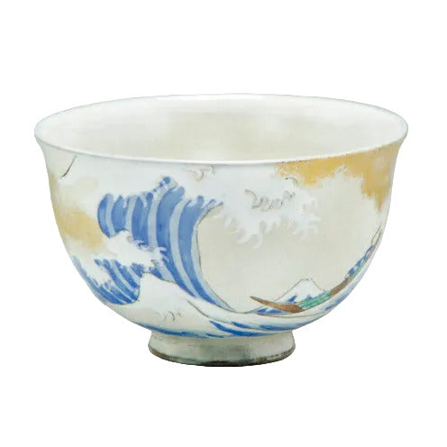 Front view of a hand-painted Kyo Ware matcha bowl decorated with cobalt blue cresting waves, white foam, Mount Fuji, and soft gold accents.