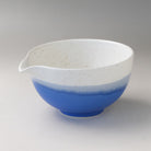 Ocean blue Mino Ware katakuchi matcha latte bowl with a white speckled glaze and pouring spout