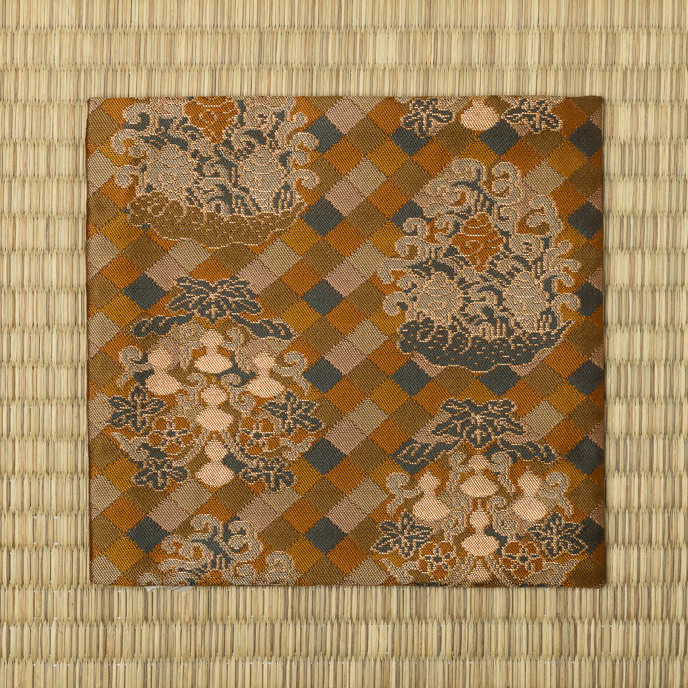 Traditional Japanese motifs woven into an Okura Nishiki silk kobukusa