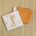Orange silk fukusa with decorative gift box for Japanese Tea Ceremony