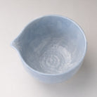 Top view of the pale blue Mino Ware katakuchi bowl showing its pouring spout and softly glazed interior.