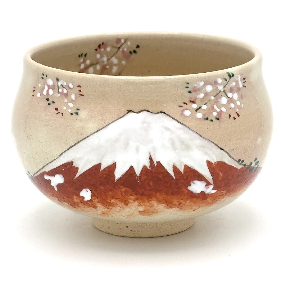 Front view of a hand-painted Kyo Ware matcha bowl featuring snowcapped Red Fuji surrounded by delicate cherry blossoms.
