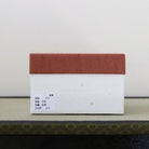 Red and white presentation box for the Ryoho Kato Heiwa White Dove Seiji Kyo-yaki matcha bowl